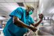 Dr. Opoku-Ware Ampomah prepares for surgery